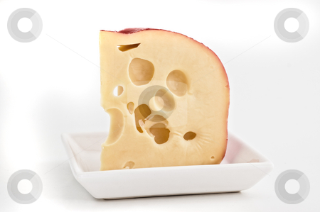 To use this stock image in your creative project, please select the size you need over to the right and click the "Add to Cart" button.
Your downloaded image will come with the Cutcaster watermark removed so don’t worry about the watermark you see on this page. Swiss cheese isolated stock photo, Swiss cheese isolated close up shot by Pablo Caridad
