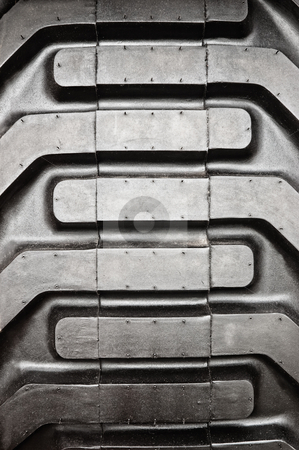 To use this stock image in your creative project, please select the size you need over to the right and click the "Add to Cart" button.
Your downloaded image will come with the Cutcaster watermark removed so don’t worry about the watermark you see on this page. Tractor tire pattern stock photo, Tractor tire pattern, close up shot. by Pablo Caridad