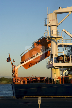 To use this stock image in your creative project, please select the size you need over to the right and click the "Add to Cart" button.
Your downloaded image will come with the Cutcaster watermark removed so don’t worry about the watermark you see on this page. Lifeboat ready to go stock photo, Lifeboat on a freight cargo ready to go by Claude Beaubien