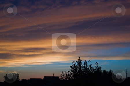 To use this stock image in your creative project, please select the size you need over to the right and click the "Add to Cart" button.
Your downloaded image will come with the Cutcaster watermark removed so don’t worry about the watermark you see on this page. Morning Sunrise stock photo, Morning Sunrise in Eastern sky of church by Ron Johnson