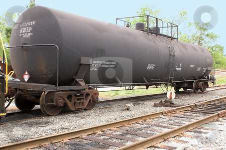 To use this stock image in your creative project, please select the size you need over to the right and click the "Add to Cart" button.
Your downloaded image will come with the Cutcaster watermark removed so don’t worry about the watermark you see on this page. Train Tanker Car stock photo, A train tanker car on railroad tracks. by Robert Byron