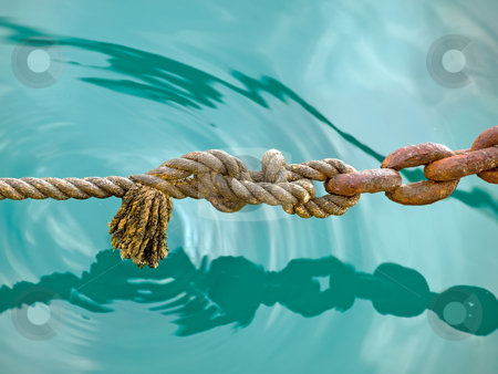 To use this stock image in your creative project, please select the size you need over to the right and click the "Add to Cart" button.
Your downloaded image will come with the Cutcaster watermark removed so don’t worry about the watermark you see on this page. Rope stock photo, Old rope with older chain above the water surface, somewhere in Adriatic Sea. by Sinisa Botas