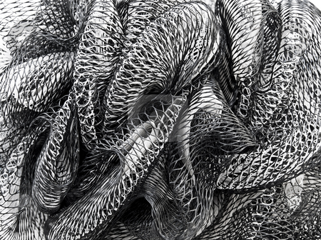 To use this stock image in your creative project, please select the size you need over to the right and click the "Add to Cart" button.
Your downloaded image will come with the Cutcaster watermark removed so don’t worry about the watermark you see on this page. Curly nets stock photo, Black and white curving nets close up by Sinisa Botas