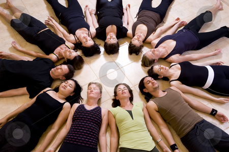 To use this stock image in your creative project, please select the size you need over to the right and click the "Add to Cart" button.
Your downloaded image will come with the Cutcaster watermark removed so don’t worry about the watermark you see on this page. Yoga class savasana stock photo, Yoga class relaxing in the 'Corpse pose - savasana'. The group is lying in a circle with heads to the inside. by Nicolaas Traut