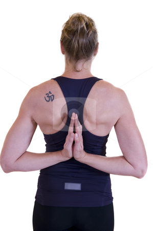 To use this stock image in your creative project, please select the size you need over to the right and click the "Add to Cart" button.
Your downloaded image will come with the Cutcaster watermark removed so don’t worry about the watermark you see on this page. Yoga woman stock photo, Beautiful mature lady doing yoga, hand together behind her back and showing a tattoo on the left shoulder. by Nicolaas Traut