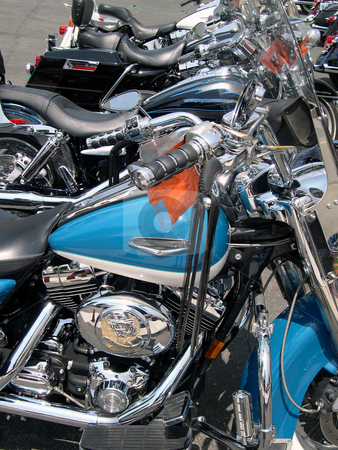 To use this stock image in your creative project, please select the size you need over to the right and click the "Add to Cart" button.
Your downloaded image will come with the Cutcaster watermark removed so don’t worry about the watermark you see on this page. Row of motorcycles stock photo, Motorcycles lined up in a row. by Rob Wright