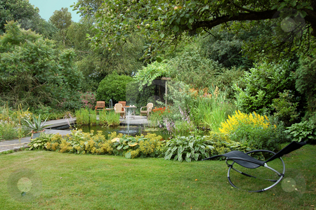 To use this stock image in your creative project, please select the size you need over to the right and click the "Add to Cart" button.
Your downloaded image will come with the Cutcaster watermark removed so don’t worry about the watermark you see on this page. Summer Garden with a Pond stock photo, by Karen Koomans