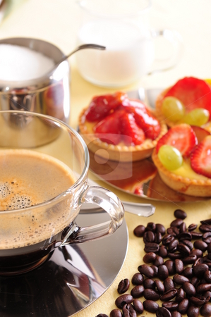 To use this stock image in your creative project, please select the size you need over to the right and click the "Add to Cart" button.
Your downloaded image will come with the Cutcaster watermark removed so don’t worry about the watermark you see on this page. Coffee and Cake stock photo, Freshly brewed coffee with a selection of pastries and cakes. Coffee beans are scattered for extra effect. by Nicolaas Traut