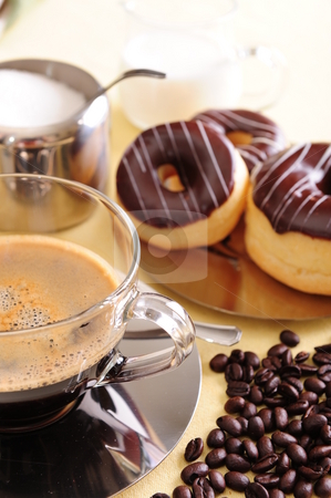 To use this stock image in your creative project, please select the size you need over to the right and click the "Add to Cart" button.
Your downloaded image will come with the Cutcaster watermark removed so don’t worry about the watermark you see on this page. Coffee and Cake stock photo, Freshly brewed coffee with a selection of pastries and cakes. Coffee beans are scattered for extra effect. by Nicolaas Traut