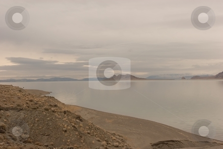 To use this stock image in your creative project, please select the size you need over to the right and click the "Add to Cart" button.
Your downloaded image will come with the Cutcaster watermark removed so don’t worry about the watermark you see on this page. Pyramid Lake stock photo, Pyramid Lake is an endorheic salt lake, approximately 188 square miles (487 km?) in area, in the Great Basin in the northwestern part of the U.S. state of Nevada by Mariusz Jurgielewicz