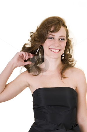 To use this stock image in your creative project, please select the size you need over to the right and click the "Add to Cart" button.
Your downloaded image will come with the Cutcaster watermark removed so don’t worry about the watermark you see on this page. Beautiful young girl dressed up for the prom stock photo, Beautiful young girl dressed in a black gown, ready to go to the prom. by Nicolaas Traut