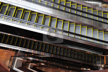 To use this stock image in your creative project, please select the size you need over to the right and click the "Add to Cart" button.
Your downloaded image will come with the Cutcaster watermark removed so don’t worry about the watermark you see on this page. Layers of escalators stock photo, Multiple layers of escalators in a shopping center. by Nicolaas Traut
