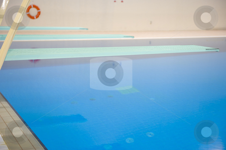 To use this stock image in your creative project, please select the size you need over to the right and click the "Add to Cart" button.
Your downloaded image will come with the Cutcaster watermark removed so don’t worry about the watermark you see on this page. Olympic diving platforms stock photo, Olympic diving platforms at an International sport venue in Doha, Qatar. by Nicolaas Traut
