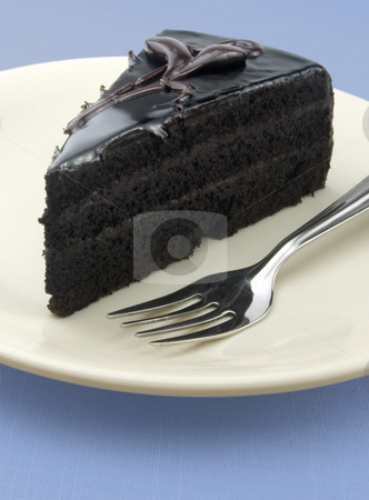 To use this stock image in your creative project, please select the size you need over to the right and click the "Add to Cart" button.
Your downloaded image will come with the Cutcaster watermark removed so don’t worry about the watermark you see on this page. Dark chocolate cake stock photo, Dark chocolate cake with icing on a blue background with fork by Khoj Badami