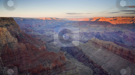 To use this stock image in your creative project, please select the size you need over to the right and click the "Add to Cart" button.
Your downloaded image will come with the Cutcaster watermark removed so don’t worry about the watermark you see on this page. Desert Dawning stock photo, First Light hitting the North Rim of the Grand Canyon as Colorado winds into the distance below. by Mike Dawson