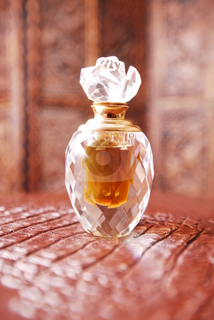 To use this stock image in your creative project, please select the size you need over to the right and click the "Add to Cart" button.
Your downloaded image will come with the Cutcaster watermark removed so don’t worry about the watermark you see on this page. Crystal perfume bottle1 stock photo, Crystal perfume bottle in romantic setting. by Nicolaas Traut