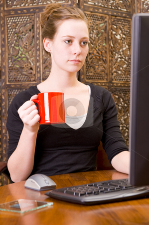 To use this stock image in your creative project, please select the size you need over to the right and click the "Add to Cart" button.
Your downloaded image will come with the Cutcaster watermark removed so don’t worry about the watermark you see on this page. Woman working on PC keyboard and mouse. stock photo, Female executive working on a PC keyboard and/or mouse on a wooden desk. by Nicolaas Traut