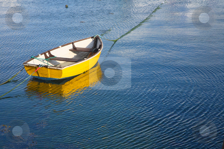 To use this stock image in your creative project, please select the size you need over to the right and click the "Add to Cart" button.
Your downloaded image will come with the Cutcaster watermark removed so don’t worry about the watermark you see on this page. A yellow boat and water ripples. stock photo, A yellow boat and water ripples. by Stephen Rees
