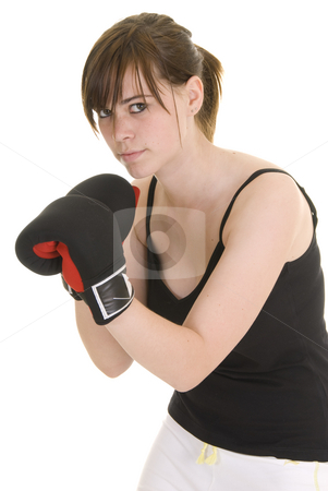 To use this stock image in your creative project, please select the size you need over to the right and click the "Add to Cart" button.
Your downloaded image will come with the Cutcaster watermark removed so don’t worry about the watermark you see on this page. Teenage girl doing sport stock photo, Teenage girl with black and white outfit, wearing boxing gloves, in various positions for boxing or martial arts. by Nicolaas Traut