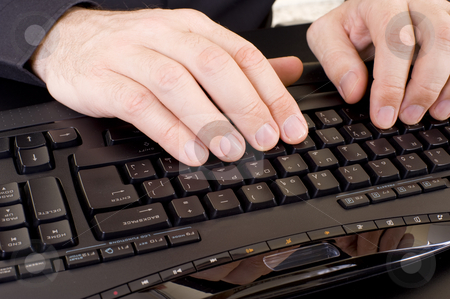 To use this stock image in your creative project, please select the size you need over to the right and click the "Add to Cart" button.
Your downloaded image will come with the Cutcaster watermark removed so don’t worry about the watermark you see on this page. Hands on keyboard stock photo, Caucasian male hands on a keyboard. by Nicolaas Traut