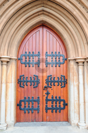 To use this stock image in your creative project, please select the size you need over to the right and click the "Add to Cart" button.
Your downloaded image will come with the Cutcaster watermark removed so don’t worry about the watermark you see on this page. Church door stock photo, Antique church door with black steel decoration in arch on an outside stone wall of a historical church building. by Nicolaas Traut
