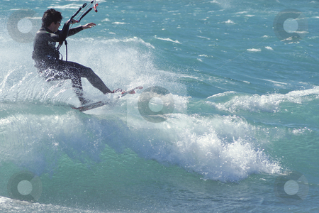 To use this stock image in your creative project, please select the size you need over to the right and click the "Add to Cart" button.
Your downloaded image will come with the Cutcaster watermark removed so don’t worry about the watermark you see on this page. Kiteboarder on the wave stock photo, Kiteboarder at the top of a wave during a windy day in French Riviera by Serge VILLA