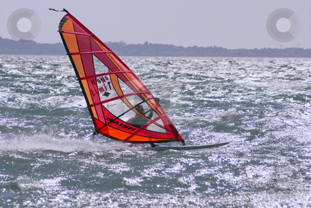 To use this stock image in your creative project, please select the size you need over to the right and click the "Add to Cart" button.
Your downloaded image will come with the Cutcaster watermark removed so don’t worry about the watermark you see on this page. Windsurfer stock photo, Windsurfer at full speed during a windy day i Mediterranean sea by Serge VILLA