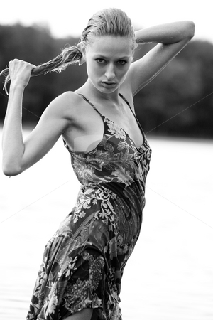 To use this stock image in your creative project, please select the size you need over to the right and click the "Add to Cart" button.
Your downloaded image will come with the Cutcaster watermark removed so don’t worry about the watermark you see on this page. Blond watergirl with long hair stock photo, Young blond woman wearing a dress in the forest by Frenk and Danielle Kaufmann