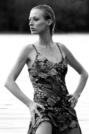 To use this stock image in your creative project, please select the size you need over to the right and click the "Add to Cart" button.
Your downloaded image will come with the Cutcaster watermark removed so don’t worry about the watermark you see on this page. Fashion watergirl stock photo, Young blond woman wearing a dress in the forest by Frenk and Danielle Kaufmann