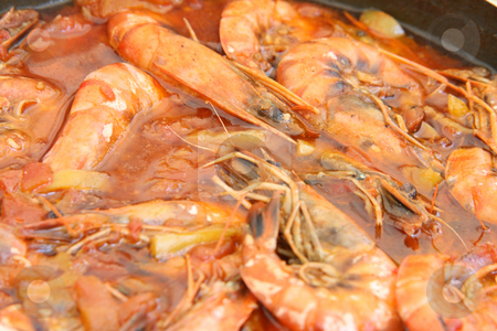 To use this stock image in your creative project, please select the size you need over to the right and click the "Add to Cart" button.
Your downloaded image will come with the Cutcaster watermark removed so don’t worry about the watermark you see on this page. Shrimps in red stock photo, Shrimps cooked in tomatoe sause mediterranean cuisine by EVANGELOS THOMAIDIS