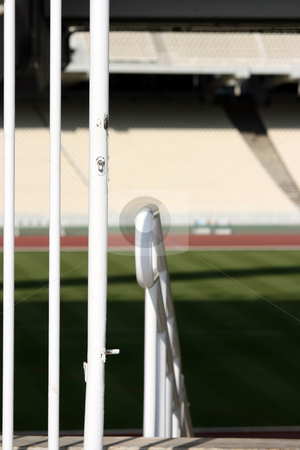 To use this stock image in your creative project, please select the size you need over to the right and click the "Add to Cart" button.
Your downloaded image will come with the Cutcaster watermark removed so don’t worry about the watermark you see on this page. Gate and stadium stock photo, Stadium gate detail with blur tiers and field in background by EVANGELOS THOMAIDIS