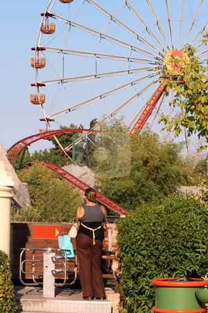 To use this stock image in your creative project, please select the size you need over to the right and click the "Add to Cart" button.
Your downloaded image will come with the Cutcaster watermark removed so don’t worry about the watermark you see on this page. Amusument park stock photo, View from amusement park roller coaster and plants by EVANGELOS THOMAIDIS