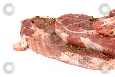 To use this stock image in your creative project, please select the size you need over to the right and click the "Add to Cart" button.
Your downloaded image will come with the Cutcaster watermark removed so don’t worry about the watermark you see on this page. Raw pork closeup stock photo, Pork chops with oregano isolated on white background with copy space by EVANGELOS THOMAIDIS