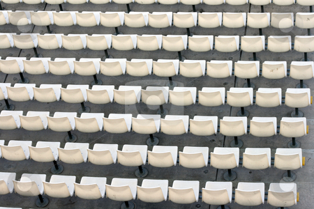 To use this stock image in your creative project, please select the size you need over to the right and click the "Add to Cart" button.
Your downloaded image will come with the Cutcaster watermark removed so don’t worry about the watermark you see on this page. White seats stock photo, White seats texture detail from stadium for background use by EVANGELOS THOMAIDIS