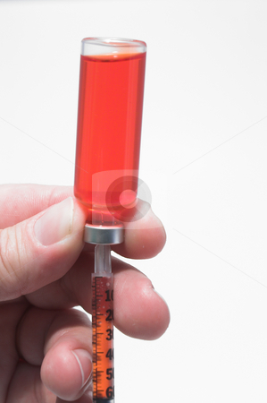 To use this stock image in your creative project, please select the size you need over to the right and click the "Add to Cart" button.
Your downloaded image will come with the Cutcaster watermark removed so don’t worry about the watermark you see on this page. Preparing an Injection stock photo, A person preparing a prescription for injection. by Robert Byron