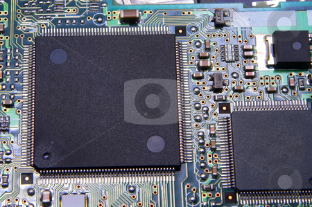 To use this stock image in your creative project, please select the size you need over to the right and click the "Add to Cart" button.
Your downloaded image will come with the Cutcaster watermark removed so don’t worry about the watermark you see on this page. Circuit Board stock photo, A close-up of a printed circuit board. by Robert Byron