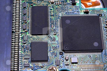 To use this stock image in your creative project, please select the size you need over to the right and click the "Add to Cart" button.
Your downloaded image will come with the Cutcaster watermark removed so don’t worry about the watermark you see on this page. Circuit Board stock photo, A close-up of a printed circuit board. by Robert Byron