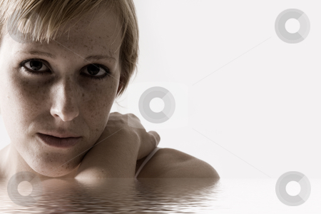 To use this stock image in your creative project, please select the size you need over to the right and click the "Add to Cart" button.
Your downloaded image will come with the Cutcaster watermark removed so don’t worry about the watermark you see on this page. Close portrait of a sad looking blond stock photo, Studio portrait of a blond short haired girl looking sad by Frenk and Danielle Kaufmann