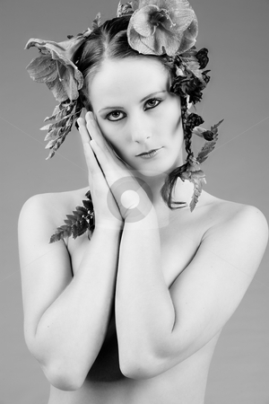 To use this stock image in your creative project, please select the size you need over to the right and click the "Add to Cart" button.
Your downloaded image will come with the Cutcaster watermark removed so don’t worry about the watermark you see on this page. Flowergirl and her hands stock photo, Young woman with big flowers in her hair by Frenk and Danielle Kaufmann