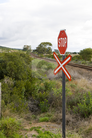 To use this stock image in your creative project, please select the size you need over to the right and click the "Add to Cart" button.
Your downloaded image will come with the Cutcaster watermark removed so don’t worry about the watermark you see on this page. Stop sign for railroad crossing stock photo, A stop sign at a railroad crossing, indicating a single rail to be crossed. by Nicolaas Traut