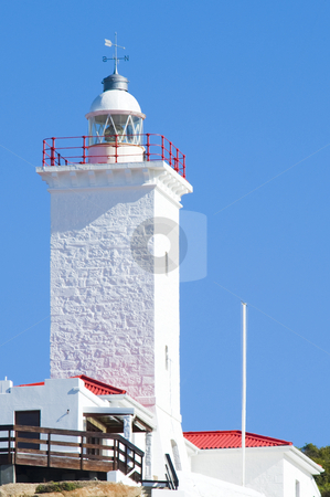 To use this stock image in your creative project, please select the size you need over to the right and click the "Add to Cart" button.
Your downloaded image will come with the Cutcaster watermark removed so don’t worry about the watermark you see on this page. Newly renovated lighthouse stock photo, A newly renovated lighthouse and weatherstation against a bright blue sky. by Nicolaas Traut