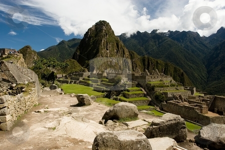 To use this stock image in your creative project, please select the size you need over to the right and click the "Add to Cart" button.
Your downloaded image will come with the Cutcaster watermark removed so don’t worry about the watermark you see on this page. Machu Picchu stock photo, Machu Picchu is a pre-Columbian Inca site located 2,400 meters (7,875 ft) above sea level. It is situated on a mountain ridge above the Urubamba Valley in Peru, which is 80 km (50 mi) northwest of Cusco. Often referred to as