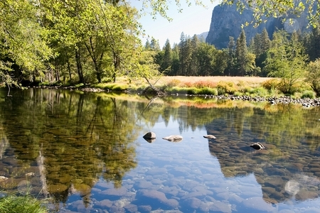 To use this stock image in your creative project, please select the size you need over to the right and click the "Add to Cart" button.
Your downloaded image will come with the Cutcaster watermark removed so don’t worry about the watermark you see on this page. Yosemite Valley View stock photo, Yosemite Valley is a world-famous scenic location in the Sierra Nevada mountains of California. by Mariusz Jurgielewicz