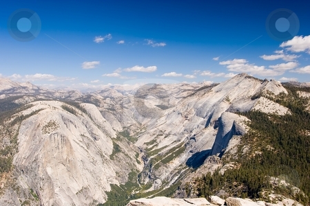 To use this stock image in your creative project, please select the size you need over to the right and click the "Add to Cart" button.
Your downloaded image will come with the Cutcaster watermark removed so don’t worry about the watermark you see on this page. Half Dome stock photo, Half Dome is a granite dome in Yosemite National Park, located at the eastern end of Yosemite Valley by Mariusz Jurgielewicz