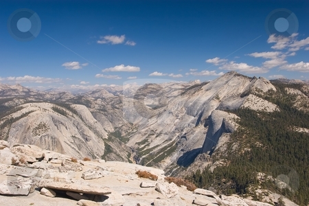 To use this stock image in your creative project, please select the size you need over to the right and click the "Add to Cart" button.
Your downloaded image will come with the Cutcaster watermark removed so don’t worry about the watermark you see on this page. Half Dome stock photo, Half Dome is a granite dome in Yosemite National Park, located at the eastern end of Yosemite Valley by Mariusz Jurgielewicz