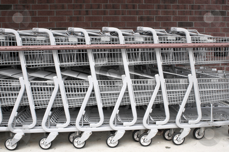 To use this stock image in your creative project, please select the size you need over to the right and click the "Add to Cart" button.
Your downloaded image will come with the Cutcaster watermark removed so don’t worry about the watermark you see on this page. Shopping Carts stock photo, A series of shopping carts at a retail store. by Robert Byron