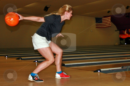 To use this stock image in your creative project, please select the size you need over to the right and click the "Add to Cart" button.
Your downloaded image will come with the Cutcaster watermark removed so don’t worry about the watermark you see on this page. Ready to Bowl stock photo, Jane ready to throw the ball down the bowling lane. by Lucy Clark