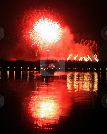 To use this stock image in your creative project, please select the size you need over to the right and click the "Add to Cart" button.
Your downloaded image will come with the Cutcaster watermark removed so don’t worry about the watermark you see on this page. Fireworks stock photo, Fireworks with reflections in a lake and a boat. by Lucy Clark