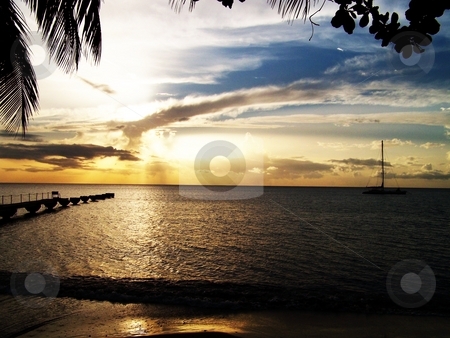 To use this stock image in your creative project, please select the size you need over to the right and click the "Add to Cart" button.
Your downloaded image will come with the Cutcaster watermark removed so don’t worry about the watermark you see on this page. THE CARRIBEAN SUNSET stock photo, by Robyn Marian