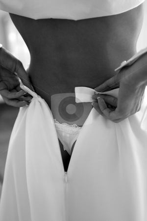 To use this stock image in your creative project, please select the size you need over to the right and click the "Add to Cart" button.
Your downloaded image will come with the Cutcaster watermark removed so don’t worry about the watermark you see on this page. Woman in changing room stock photo, Woman in changing room trying on her skirt. by Martin Crowdy